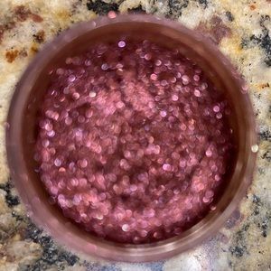 Mac glitter reflects blackened red